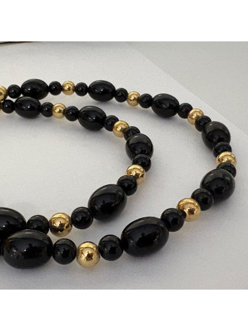 Black and Gold Tone Beaded Necklace Oval and Round Beads 30 in Classic Versatile